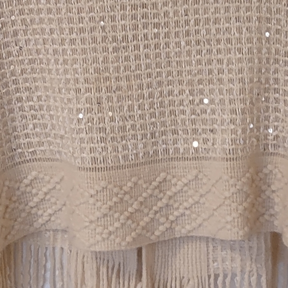 Festive knitted poncho in shimmering cream. Holiday Savings! - Picture 4 of 4